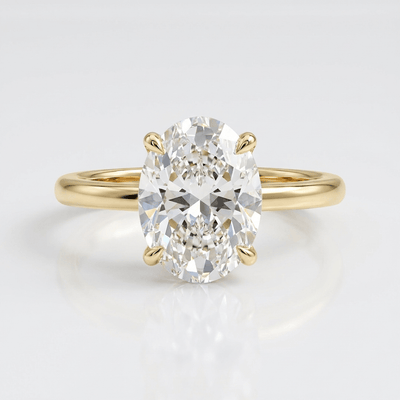 GOLD OVAL DIAMOND SOLITAIRE RING