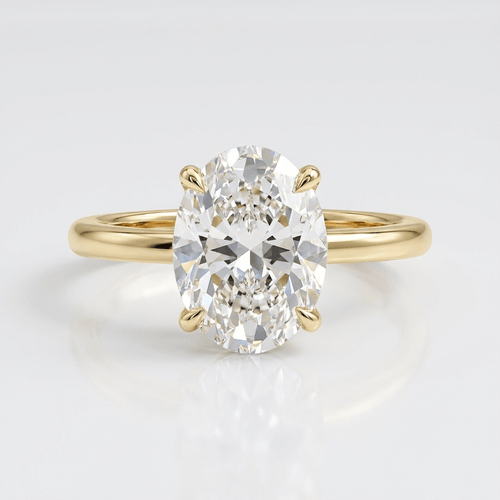 GOLD OVAL DIAMOND SOLITAIRE RING
