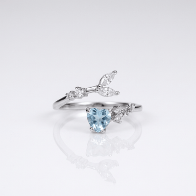 SILVER BLUE TOPAZ SOLITAIRE RING - (ADJUSTABLE)