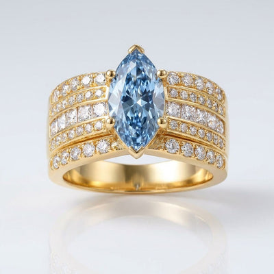 BLUE MARQUISE CRYSTAL GOLD WIDE BAND RING