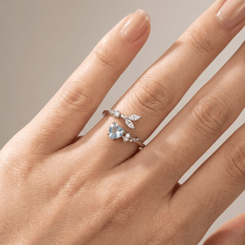 SILVER BLUE TOPAZ SOLITAIRE RING - (ADJUSTABLE)